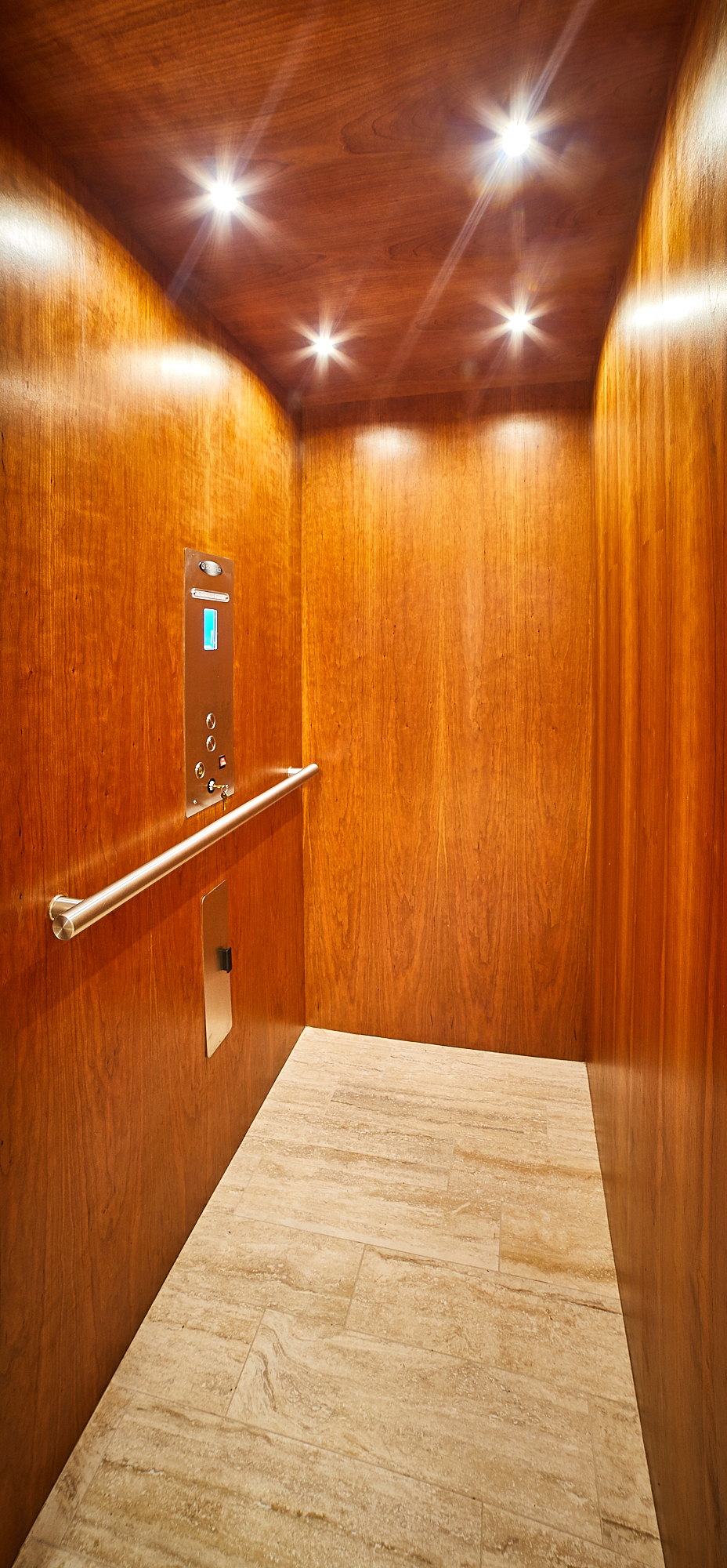 Wood-finished Savaria elevator cab Wood-finished Savaria elevator cab